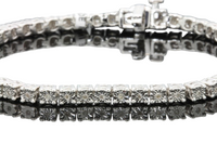 
              .35 CARAT REAL DIAMONDS STERLING SILVER RHODIUM FANOOK REAL DIAMOND 1 ROW LINK TENNIS BRACELET - 7.25 INCHES
            