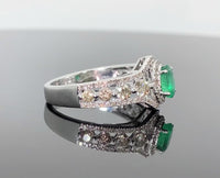 
              10K WHITE GOLD 1.30 CARAT DIAMOND & EMERALD RING
            