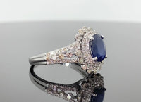 
              10K WHITE GOLD 2.50 CARAT DIAMOND & BLUE SAPPHIRE RING
            