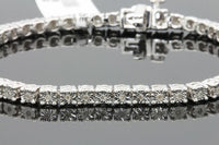 
              .35 CARAT REAL DIAMONDS STERLING SILVER RHODIUM FANOOK REAL DIAMOND 1 ROW LINK TENNIS BRACELET - 7.25 INCHES
            